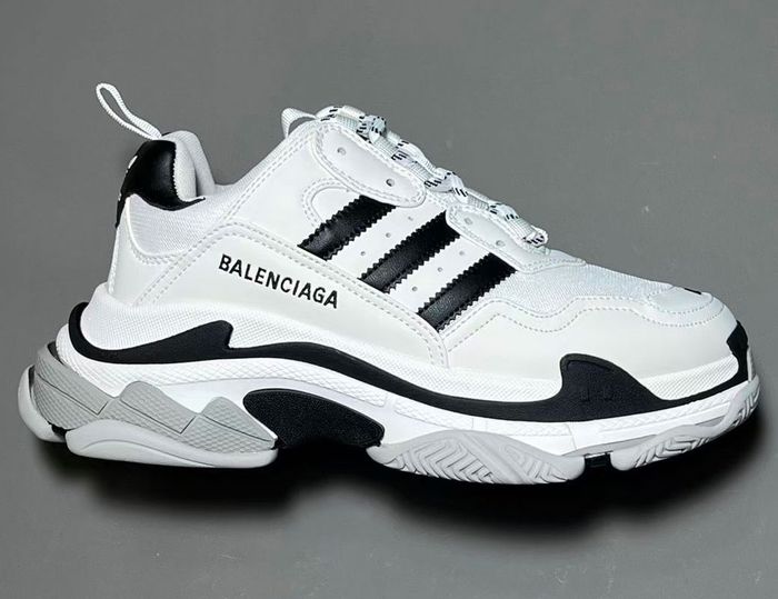 Balenciaga x adidas Triple S product image of a white sneaker with black details.