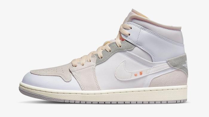 Air Jordan 1 Mid Inside Out product image of a white and grey sneaker.