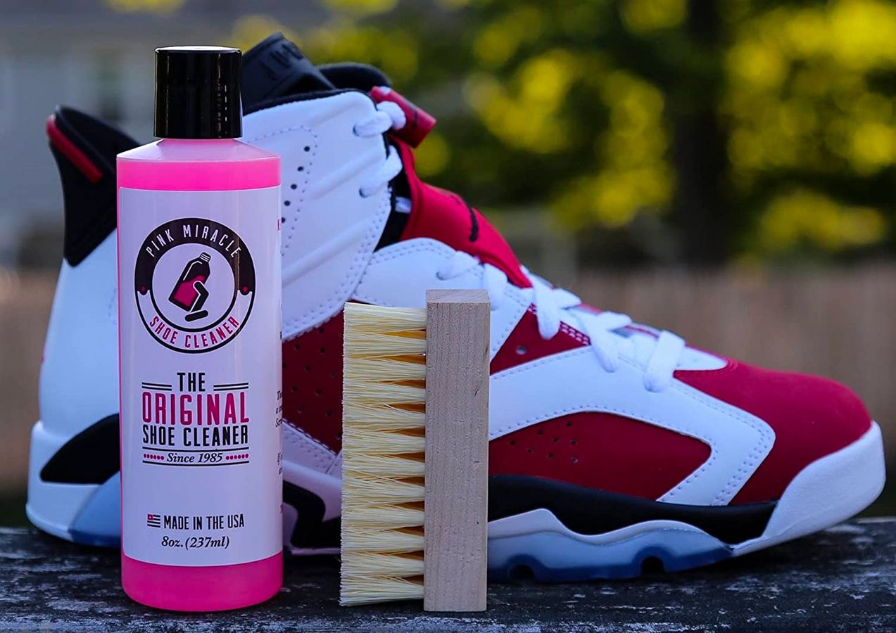Pink Miracle product image of pink shoe cleaner next to a red and white Jordan.
