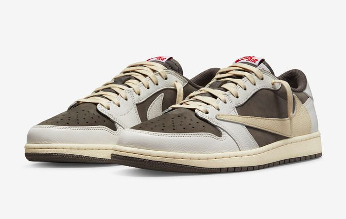Best Air Jordan 1 Colorways "Reverse Mocha" product image of a sail and brown sneaker with red accents.