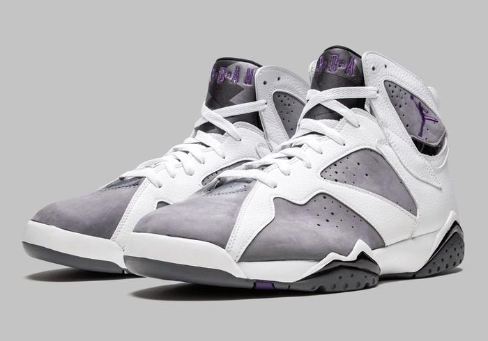 Best Air Jordan 7 colorways "Flint" product image of a pair of grey sneakers with white overlays.