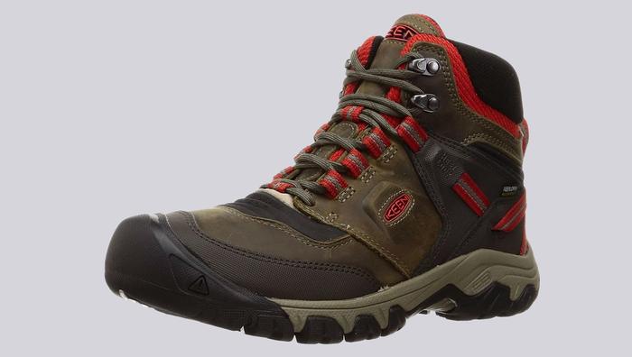 Best hiking boots KEEN product image of a single brown and red boot.