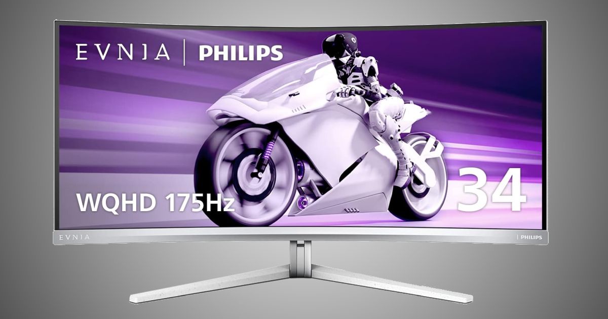 Philips Evnia 34M2C8600 product image of a light silver ultrawide screen with someone riding a white motorbike surrounded by purple light on the display.