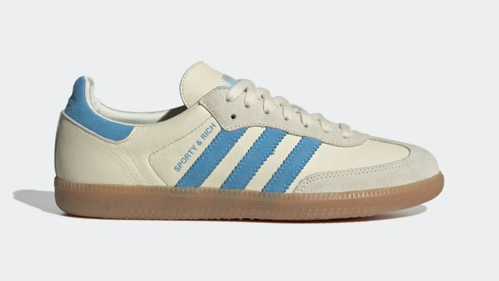 Sporty & Rich x adidas Samba "Beige Blue" product image of a cream low-top featuring light blue stripes and details and a beige rubber outsole.
