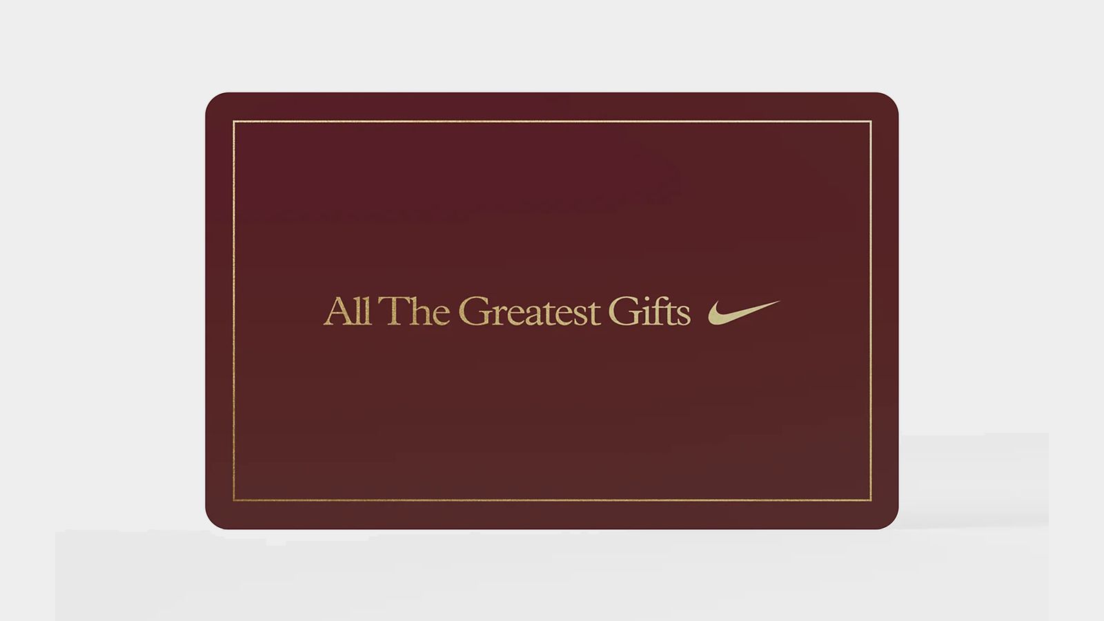 Nike Digital Gift Card product image of a dark red card with gold trim and branding.