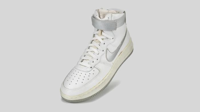Air Force 1 history - Nike product image of an original 1982 white and grey Air Force 1 high-top.