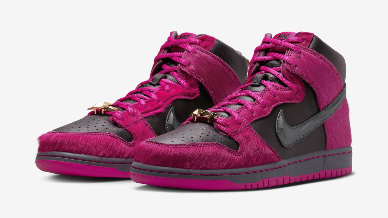 Run The Jewels x Nike SB Dunk High "Active Pink Black" product image of a black pair of sneakers featuring pink pony-haired overlays and jewelled details.