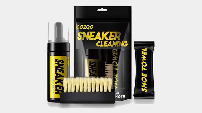 Best shoe cleaning kit - COZGO product image of a black and yellow cleaning kit with a spray bottle, towel, and brush.