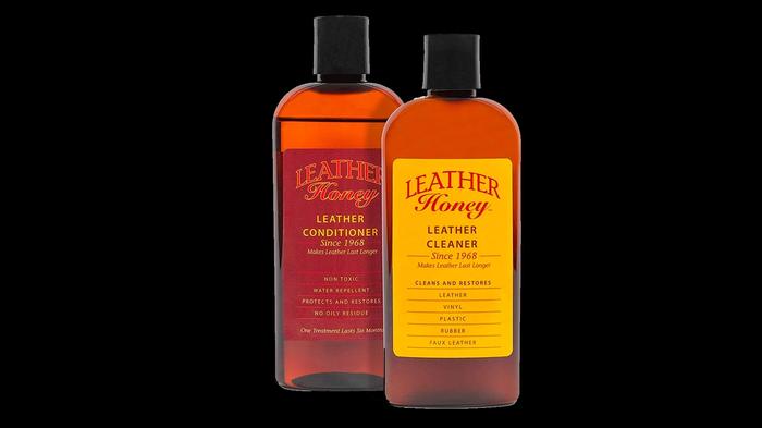Best leather cleaner for shoes - Leather Honey Complete Leather Care Kit product image of two brown bottles with dark red and yellow labelling.
