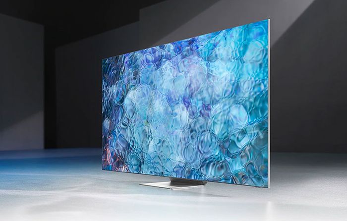 Best TV for Sports Games Samsung product image of an ultra thing TV with an abstract blue background on its display