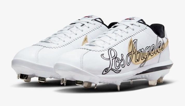 Nike Luna Cortez product image of a pair of white baseball cleats with gold motifs and Los Angeles along the sides.