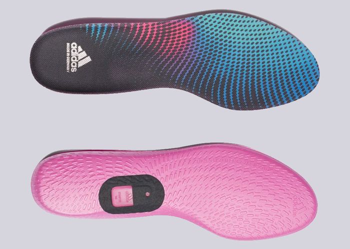 adidas football cleat insoles product image of pink and blue insoles.