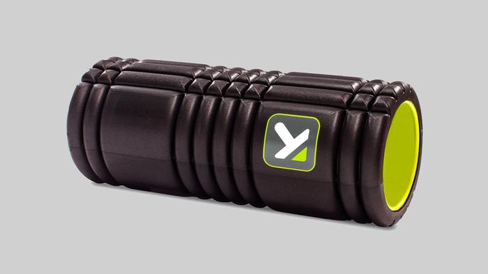 Black and yellow foam roller.