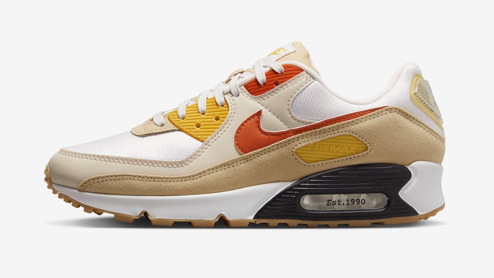 Nike Air Max 90 "Pressure" product image of a Summit White and Sesame sneaker feature orange details and a black and white midsole.