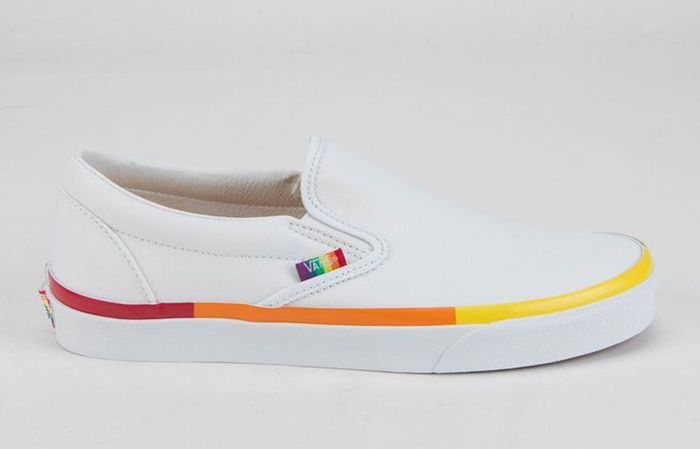 Best Vans shoes Classic Slip-On product image of a single white sneaker with rainbow accents.