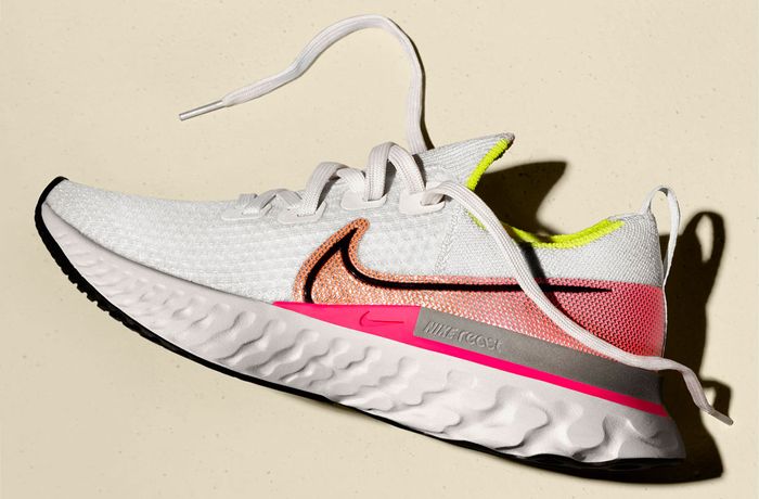 Nike product image of a white and pink unlaced Infinity React sneaker.