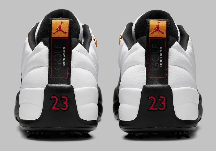 Air Jordan 12 Low Golf "Taxi" product image of a white sneaker with black overlays, gold accents, and spikes underfoot.