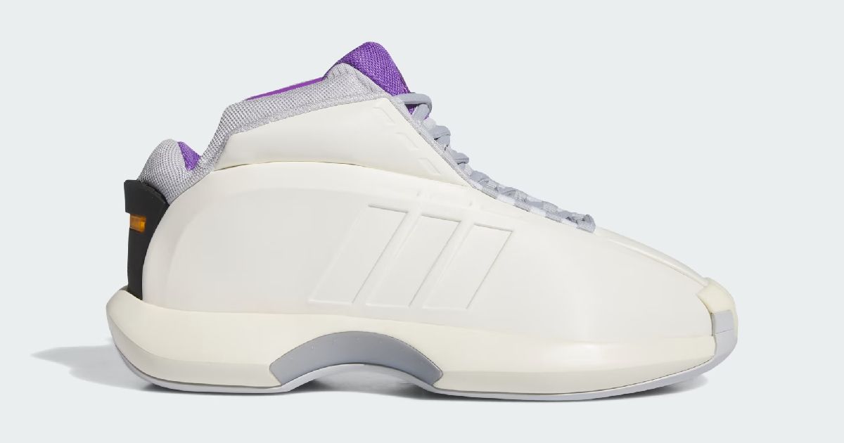 A cream white and gray adidas Crazy 1 featuring a purple inner lining.