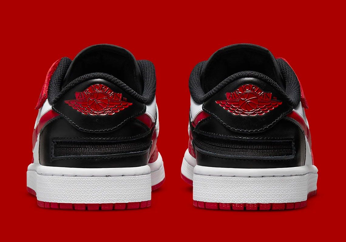 Air Jordan 1 Low Flyease product image of a white sneaker with black and red overlays.