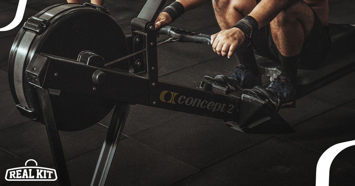 Image of someone using a black Compact rowing machine.