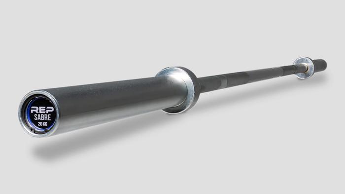 Best barbell - REP FITNESS Sabre product image of a silver barbell with a zinc finish featuring a blue and black-branded cap on the end.