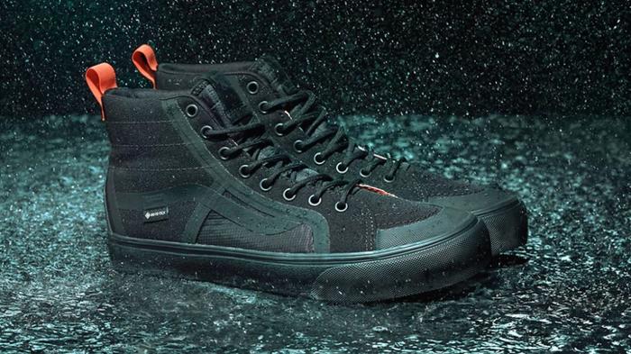 Best Vans collabs - RÆBURN x Vans Sk8-Hi GTX VR3 product image of a black pair of high-tops with red tabs on the heels.