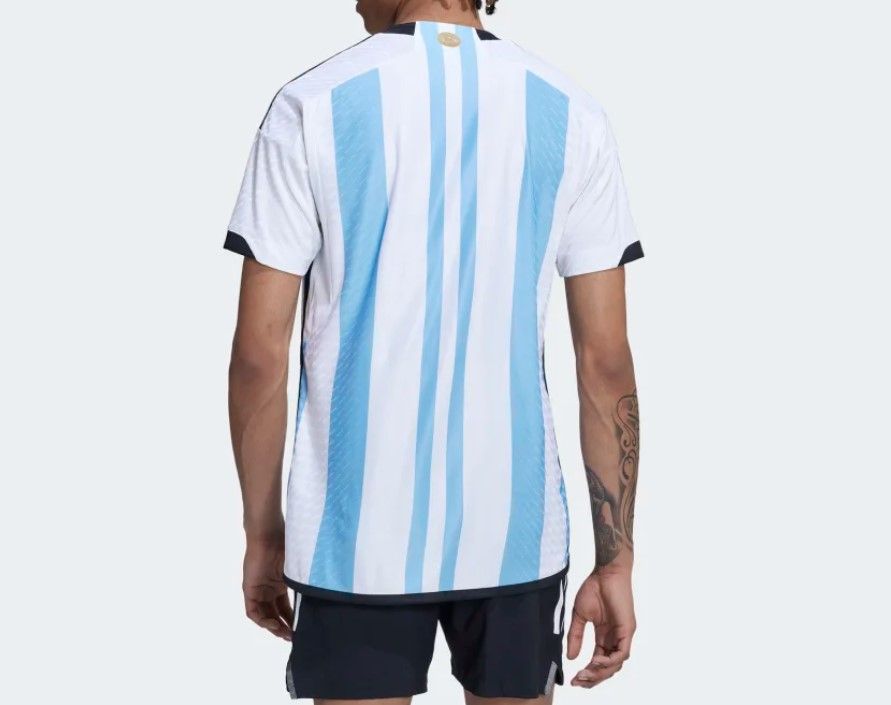 Argentina 2022 home kit product image of a white and blue striped kit with black accents.