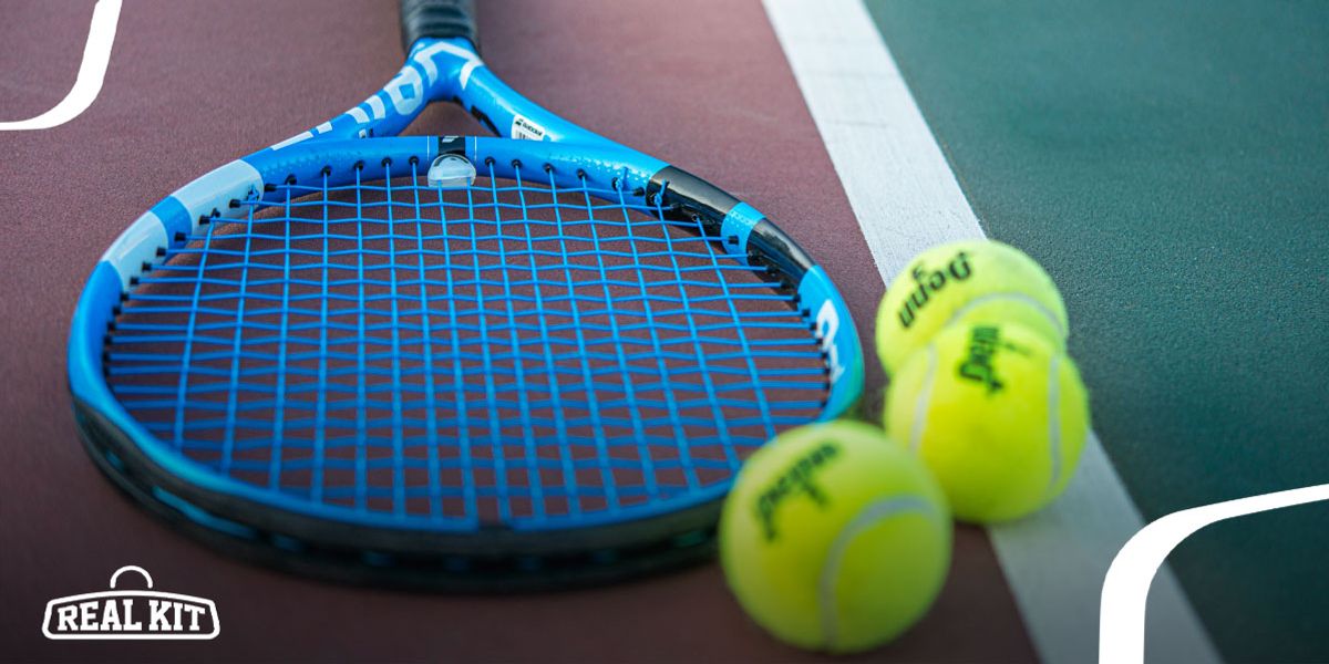 Image of a blue and black tennis racquet next to three yellow tennis balls.