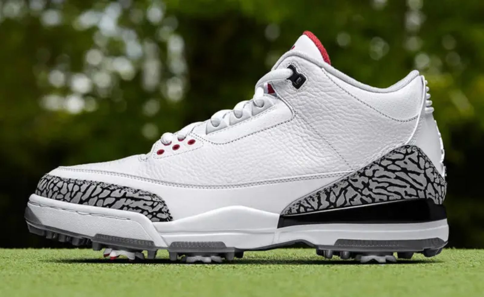 Air Jordan 3 Golf "White Cement" product image of a single white shoe with grey and black details around the heel and toe.