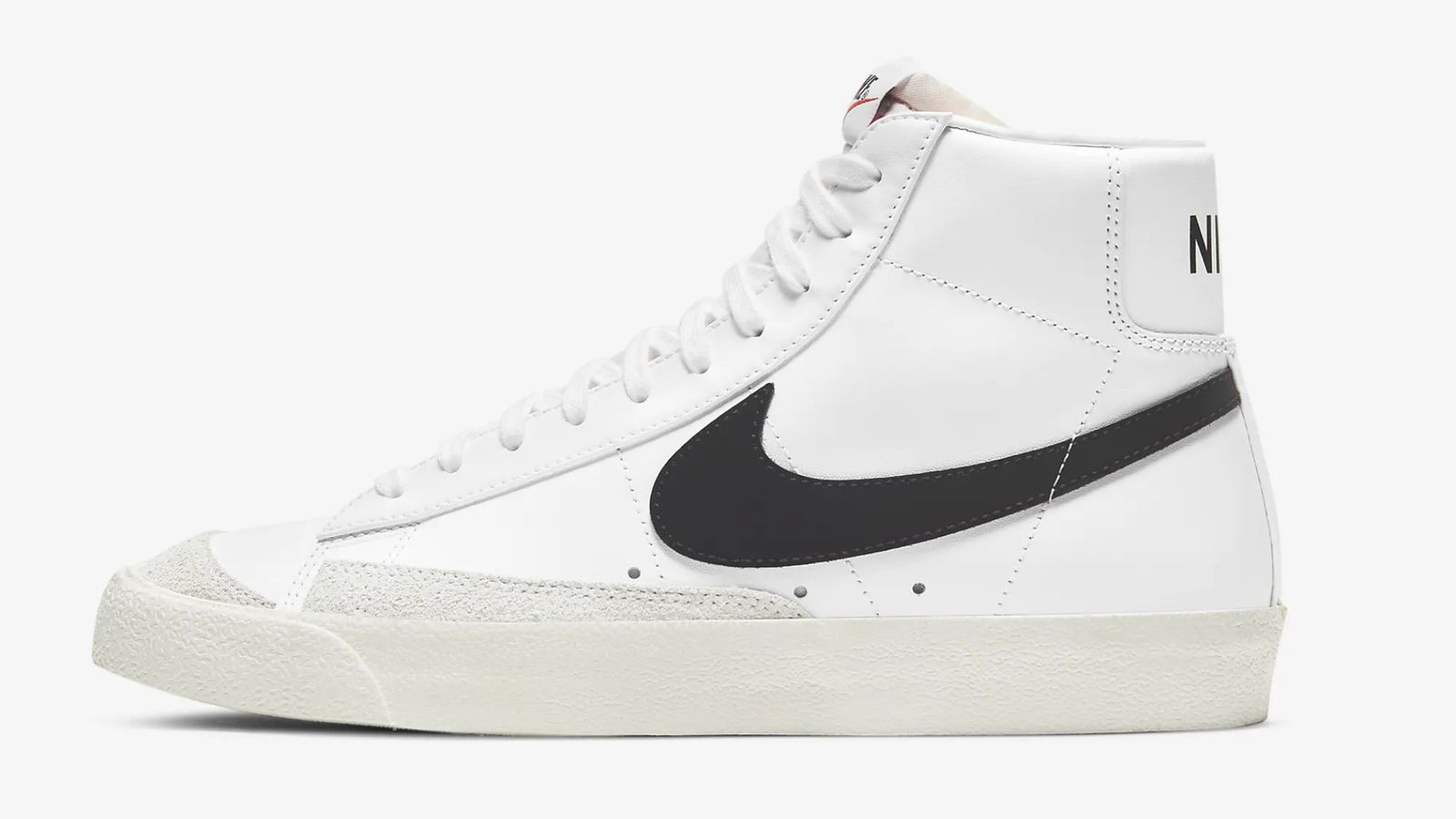 Nike Blazer '77 product image of a white leather high-top with a black Swoosh and a light grey mudguard and sole.