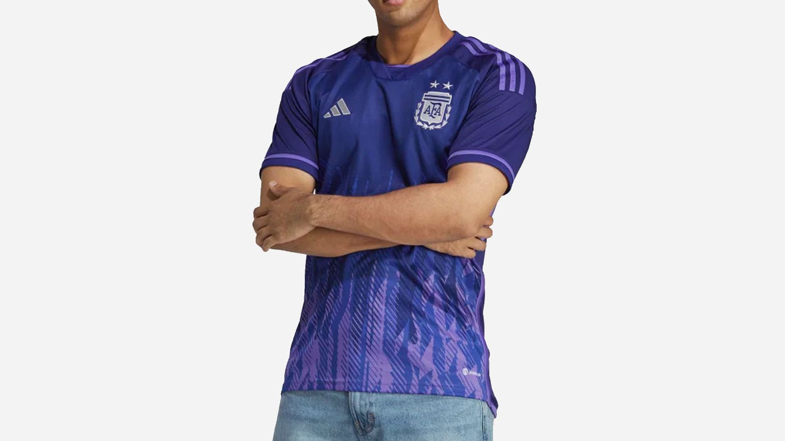 Argentina 2022 World Cup away kit adidas product image of a purple shirt with a faded lighter purple pattern towards the bottom.