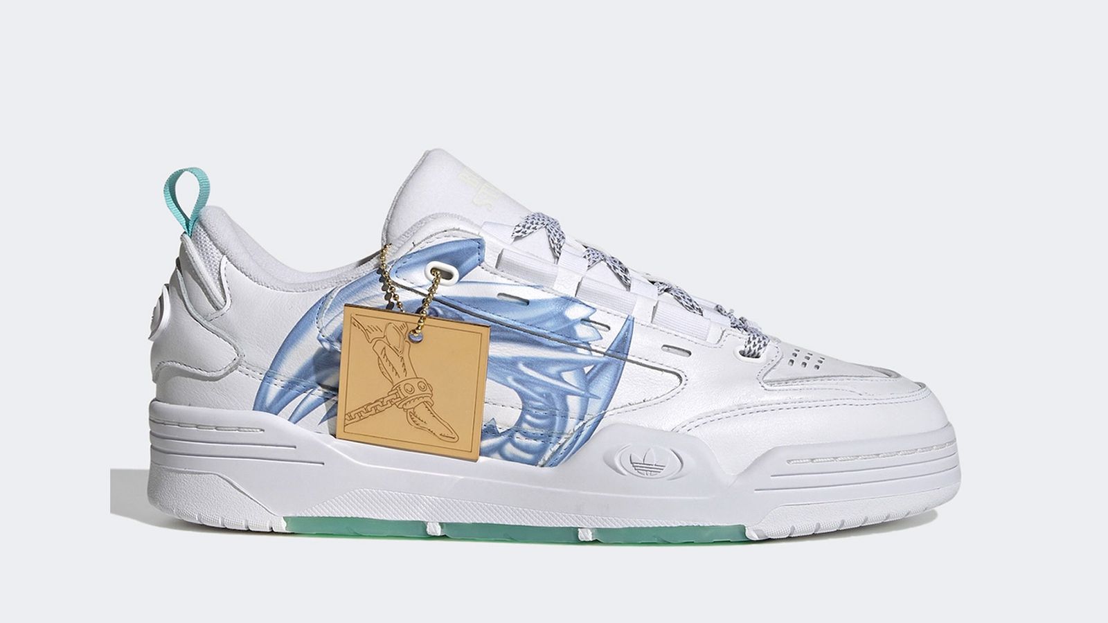 Yu-Gi-Oh! x adidas ADI2000 product image of a white sneaker with a graphic of Blue Eyes White Dragon on the side and a golden hang tag.
