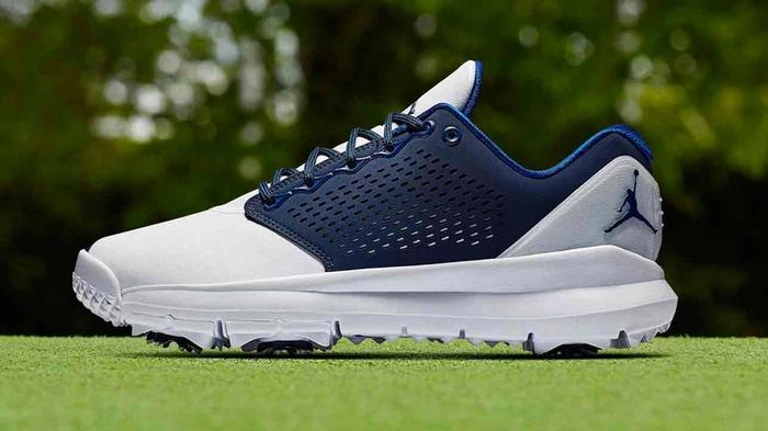 Best Jordan golf shoes Trainer ST G product image of a single white and blue spiked sneaker.