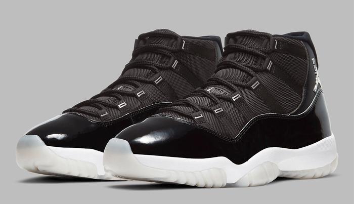 Best Air Jordan 11 colorways Jubilee 25th Anniversary product image of a pair black sneakers with white soles.