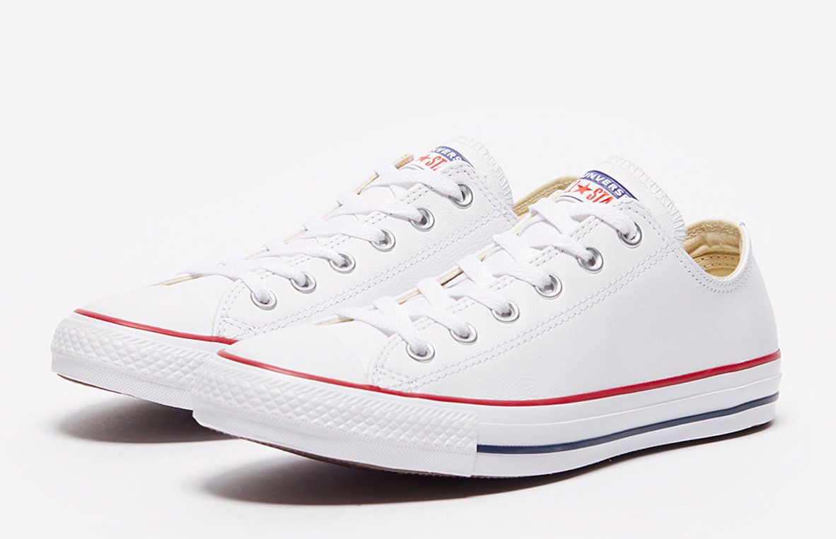 Converse product image of white Chuck Taylor All Star's with red and blue accents.