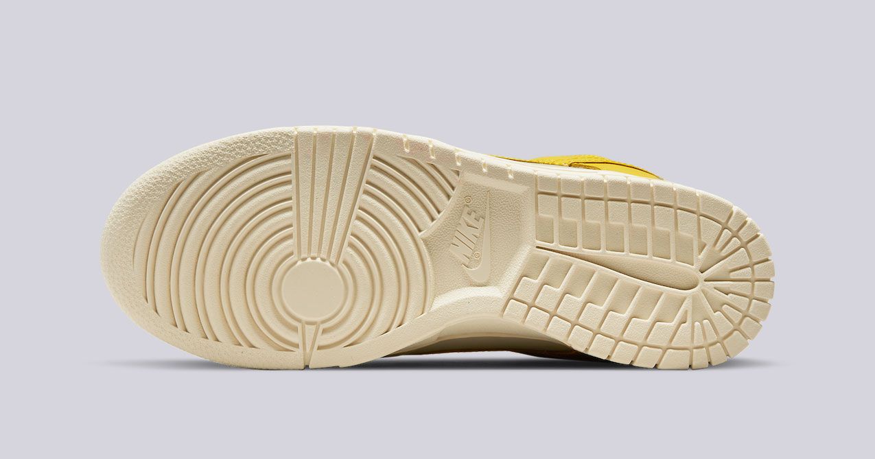Nike Dunk Low "Banana" product image of an off-white leather sneaker with yellow overlays.