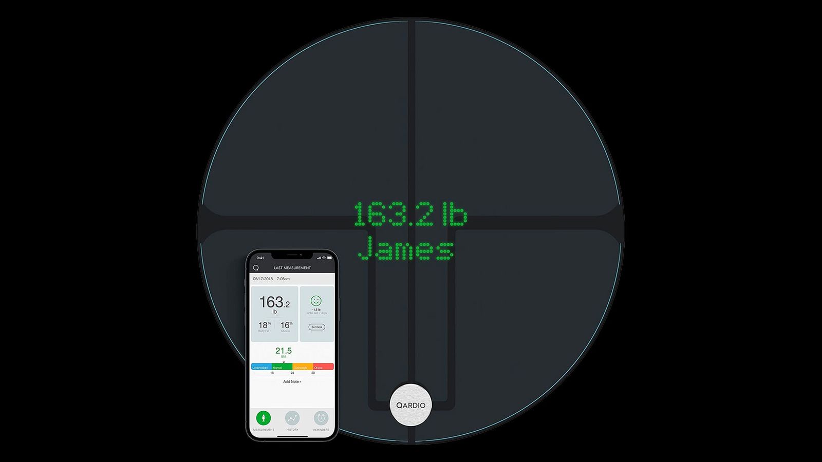 QardioBase 2 product image of a black, circular scale with an accompanying smartphone and the weight of someone called 'James' on the display.