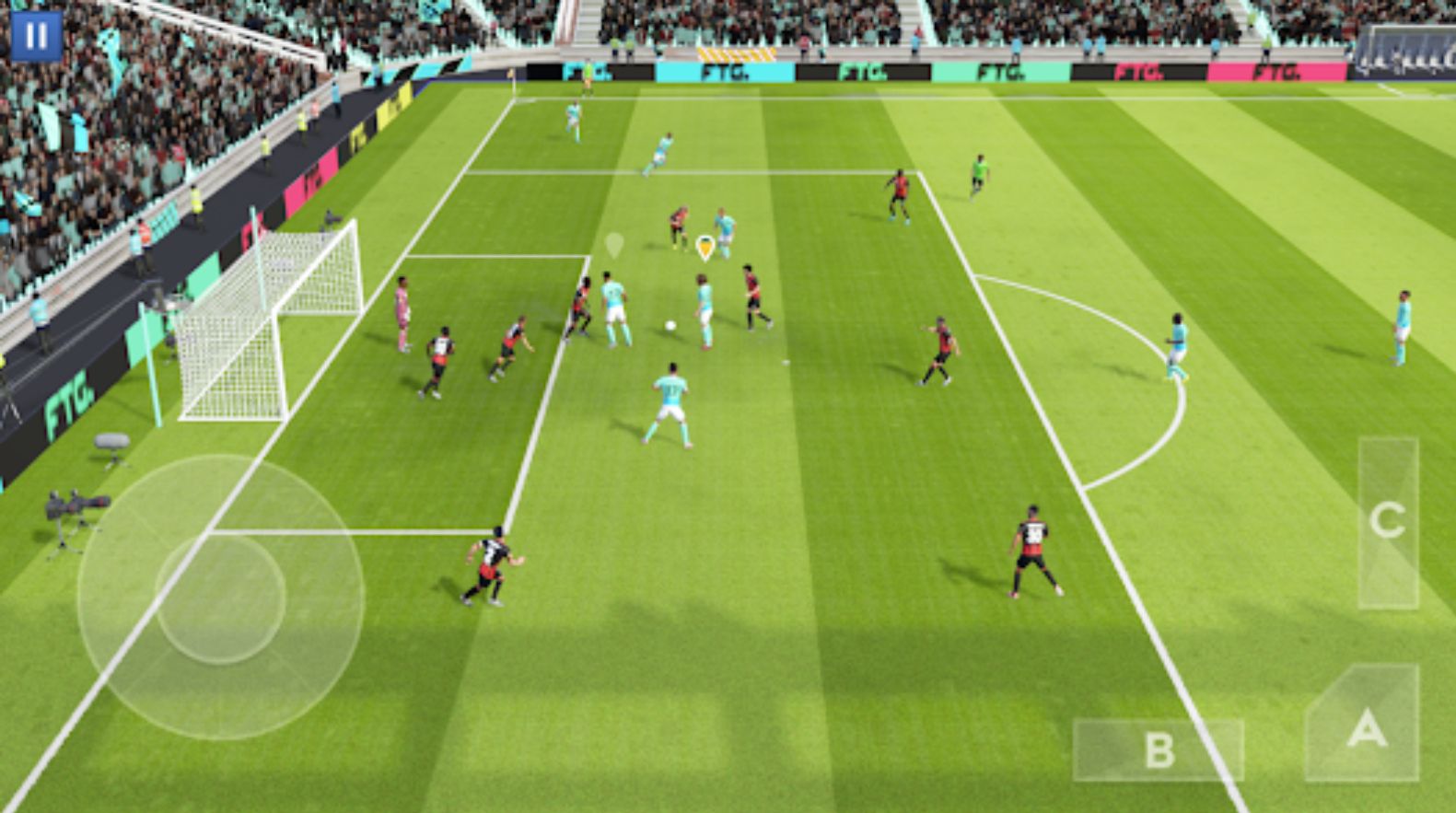 Dream League Soccer in-game image of a team in blue and white attacking a team in red and black's box.