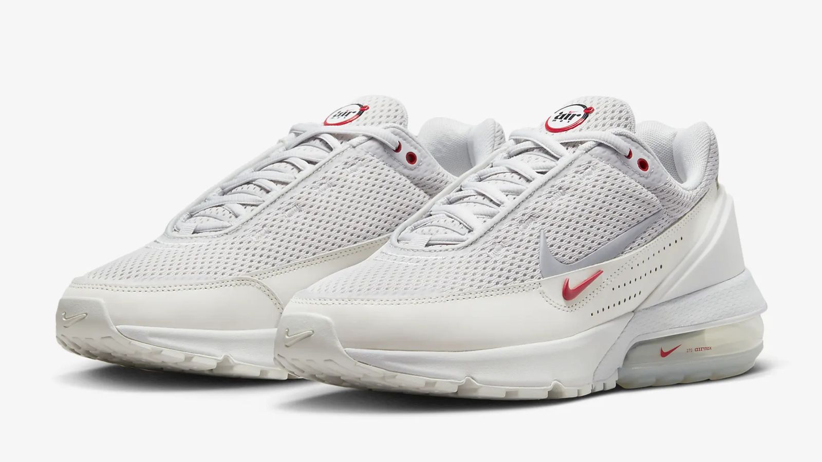 Air Max Day 2023 - Nike Air Max Pulse "Phantom High Pulse" product image of a white pair of mesh sneakers with red accents.