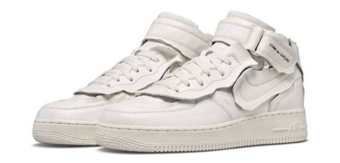 COMME des GARÇONS x Nike Air Force 1 Mid product image of white sneakers with deconstructed panels.