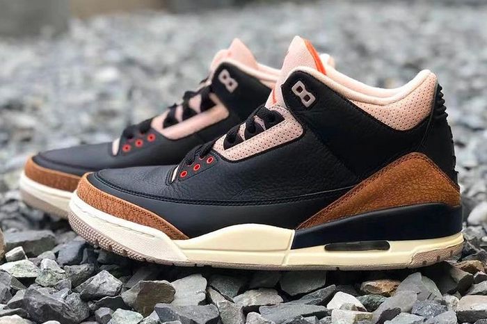 Upcoming Air Jordan 3 colorways "Desert Elephant" image of a pair of black sneakers with cream accents and brown, elephant-print mudguards.