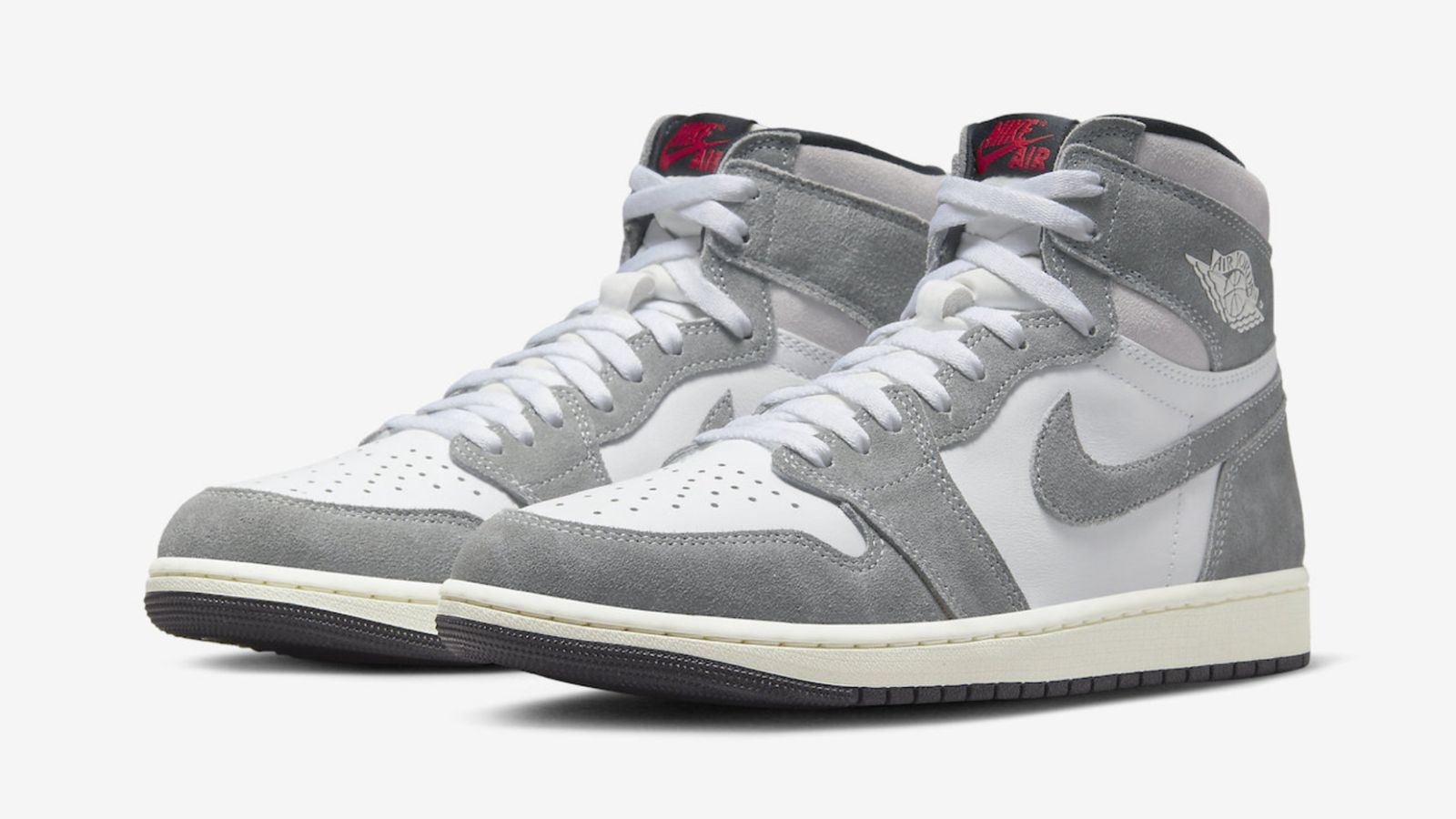 Air Jordan 1 High "Washed Black" product image of a white leather and washed grey suede high-top featuring black details and red branding.