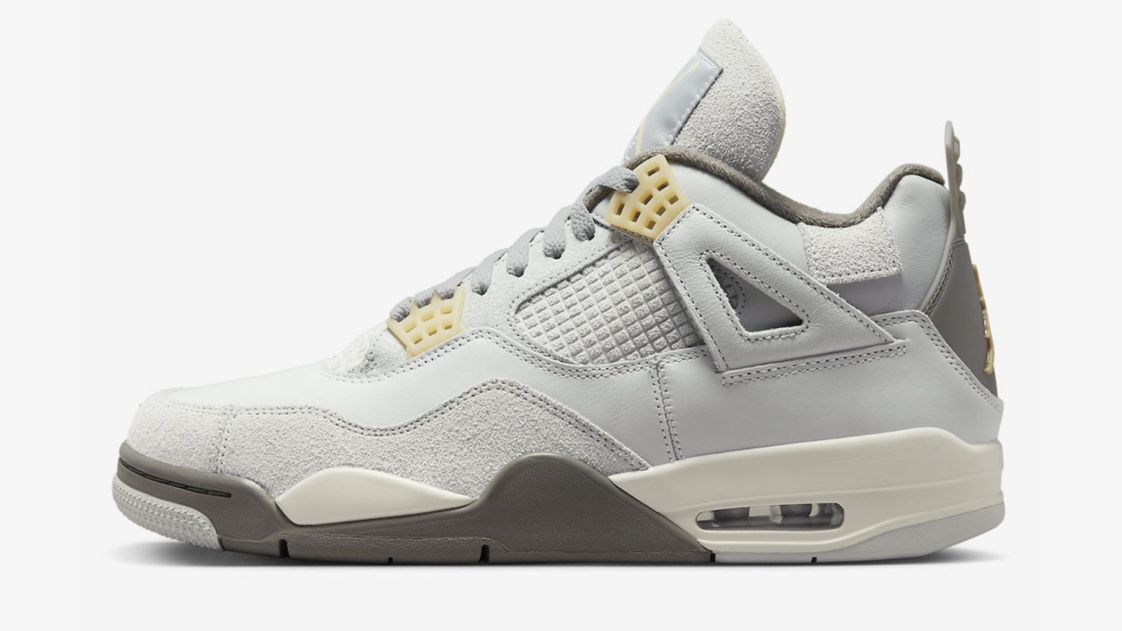 Air Jordan 4 "Photon Dust" product image of a pale grey sneaker with darker grey and vanilla accents.
