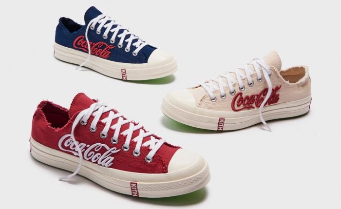 Coca-Cola x KITH x Converse Chuck Taylor All-Star 70 Ox product image of a navy, cream white, and dark red pairs of Coca-Cola branded low-top sneakers.