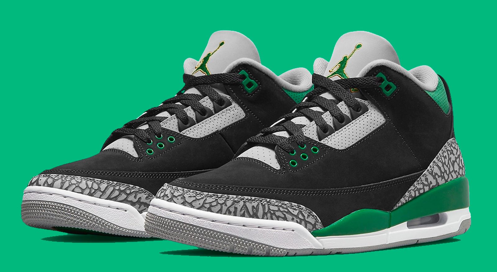 Best Air Jordan 3 colorways "Pine Green" product image of a pair of black sneakers with green details and grey underlays.
