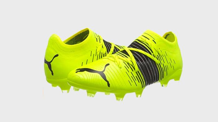 Best football boots under 100 PUMA product image of a pair of yellow and black boots.