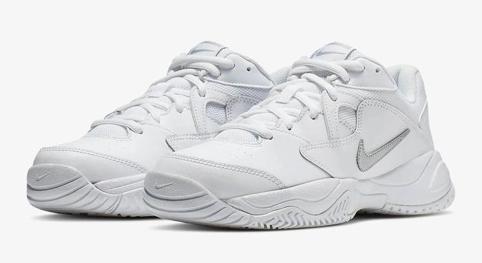 Best tennis shoes Nike product image of a pair of all-white sneakers.