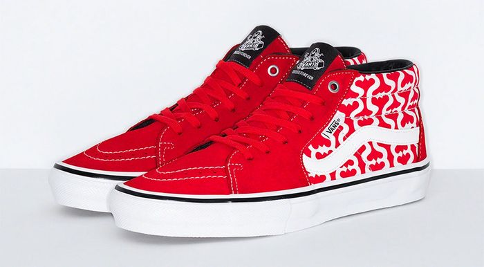 Supreme x Vans Skate Grosso Mid Monogram S Logo product image of a red pair of sneakers with white accents and pattern towards the heels.