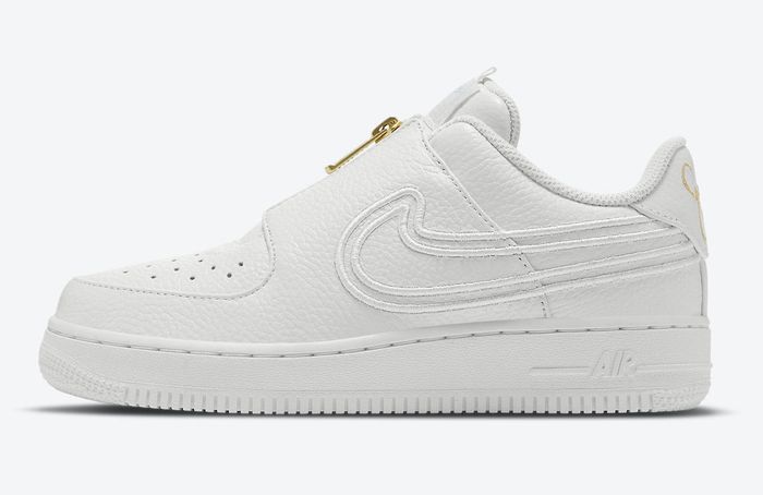 Serena Williams Design Crew x Nike Air Force 1 Summit White product image of an all-white sneaker with golden accepts including a zip-up lock-in system.