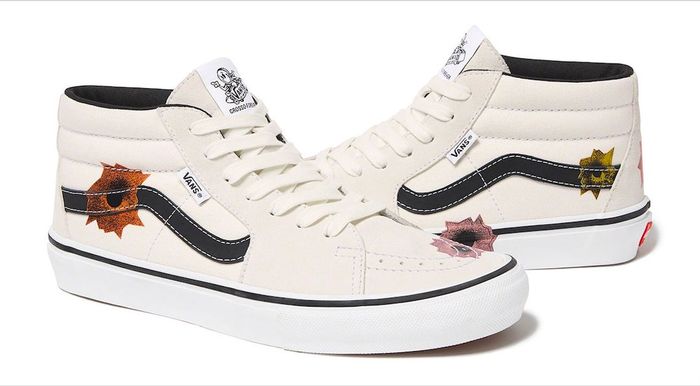 Supreme x Vans Nate Lowman Skate Grosso Mid product image of a black pair of sneakers with bullet hole graphics.